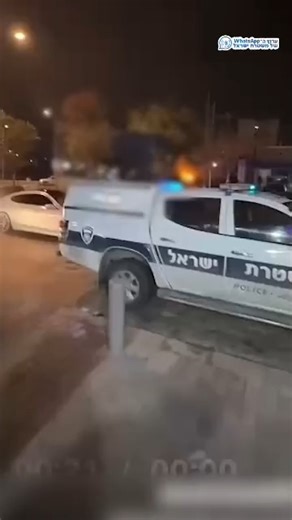 Jewish Breaking News on Instagram: "🚨TikTok Stunt on a Jerusalem Police Cruiser Ends in an Arrest Jerusalem District Police arrested a Beit Hanina resident in his 30s after a video surfaced showing him dancing on the roof of a marked police vehicle in the neighborhood. According to police-linked reports, the incident began when officers from Shafat Station (Kedem area) were called to handle an incident in Beit Hanina, and the suspect used the moment to climb onto the patrol car while someone fi