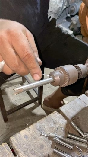 Creating a steel wire spring on drill machine -by hand old craftsmanship #shortvideo #shorts #diy