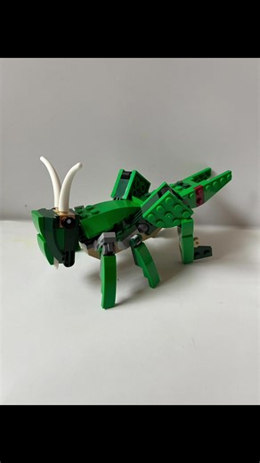 My 3 in 1 Lego set of pterodactyl, triceratops, t-Rex & Brontosaurus has turned into a 14th creation of a grasshopper