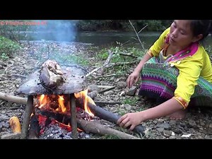 Primitive Technology - Catch big fish at river and cooking fish on a rock - Eating delicious