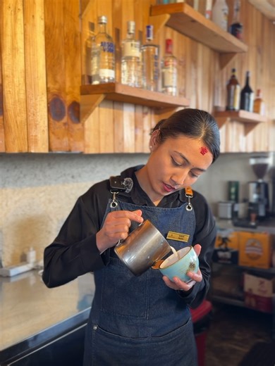 The art of hospitality, one pour at a time. ☕✨ Meet the woman behind the machine at Daura Thakali. Precision, passion, and the perfect brew she brings a modern craft to our traditional space every single day. As we count down to International Women’s Day, we celebrate the skill and energy she pours into every cup. #WomenOfDaura #BaristaLife #LatteArt #DauraThakali #WomensDay2026 #CoffeeCulture