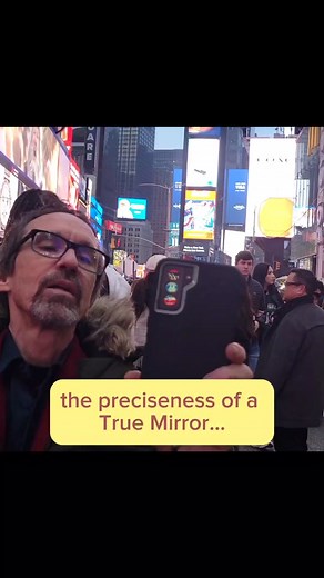 a perfect 90 degree angle is needed to make a True Mirror work, otherwise your eyes are distorted. Temperature and humidity messes with that angle, so you have to be able to adjust it. using object is the background helps figure it out, and with these billboards 1000 feet away, it's really easy to make it perfect #truemirror #timessquare