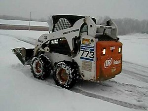 Plowing snow with Bobcat 773