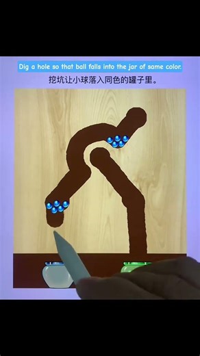 Dig a hole so that the ball falls into the jar of the same color.#short #shortvideo #viralshort