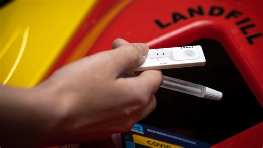 Rapid antigen tests are piling up in homes and offices, but they can't be recycled. Here's why