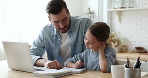 Young Father Checking Homework Helping Cute Stock Footage Video (100% Royalty-free) 1050934606 | Shutterstock