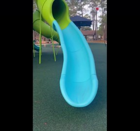 Fearless kid shows how NOT to head down a park slide