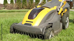 Replacing battery in lawn mower. Electric lawn mower