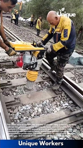 Railroad tie tamping: people using a machine to tamp railroad ties