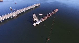 Yearslong effort to remove sunken barge hits new snag in Providence