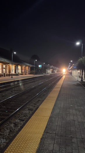 Getting a ton lens flare from KCS 4064( I guess it’s CPKC now), an SD70ACe, heading south with freight train past Deerfield, IL’s charming station on 8/14/25. #kansascitysouthern #cpkc #freightrain #chicago #nighttrain | Rail Brothers