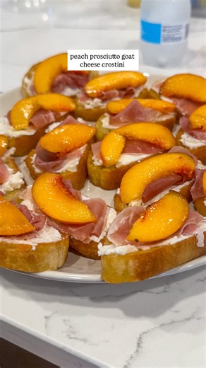Ivanna Hanley | Easy Recipes on Instagram: "peach prosciutto crostini 🍑 Enjoying peaches until the very last second!!! This is the EASIEST appetizer to bring. Prep crostini ahead of time, pack prosciutto, one peach & goat cheese. Then you just need to quickly slice the peach & assemble. It’s such a hit! And you only need 4 ingredients 💯 Ingredients: Mini baguette 1 small goat cheese 1 peach 1 pack of prosciutto Directions: 1. Slice baguette & add to a frying pan with olive oil, c