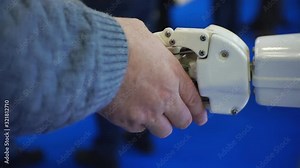 Human handshake with a robot. The concept of human interaction with artificial intelligence. Handshake close-up. Modern technology and science.1920X1080 Full Hd.