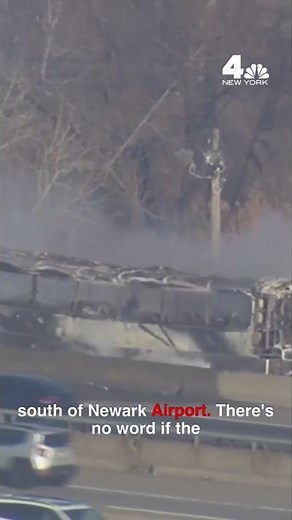 NJ Transit bus ERUPTS in flames on Jersey Turnpike | NBC New York