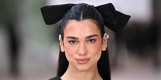 Dua Lipa Frees the Nipple in a Sheer, Bust-Cutout Dress While Debuting Lightest Hair in Years