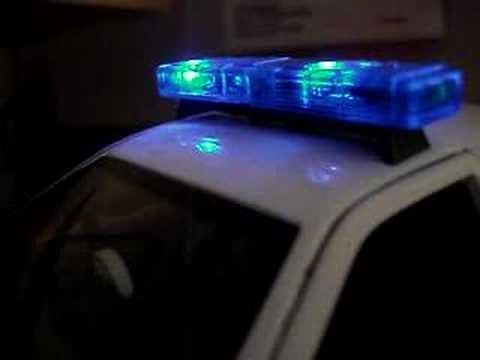 1:24 scale diecast police car with custom flashing lights!