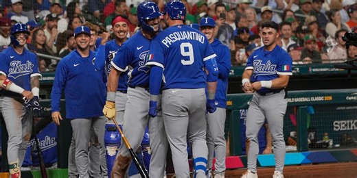 Perfect Italy surges into quarterfinals powered by caffeine and kisses