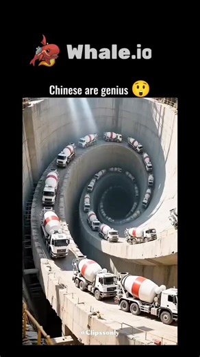 Trend on Instagram: "The post showcases a video of cement mixer trucks spiralling up a vast concrete ramp at a Chinese construction site, enabling continuous pouring for massive structures like dams, highlighting efficient engineering. This technique reflects real Chinese infrastructure innovations, as seen in documented projects from 2024–2025, though some replies dismiss it as AI-generated due to its hypnotic visuals. Posted by a Rwandan poultry farmer and veterinarian, the caption's "Chenise
