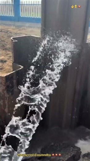 Driving metal sheet pile underground for construction site 🏗️