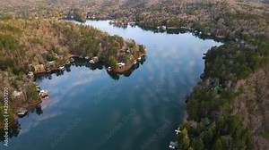 Lake Rabun, Georgia, USA, Aerial View of Lake Dam and retention wall reflective lake water with trees, homes and roads, Rabun County, GA, USA