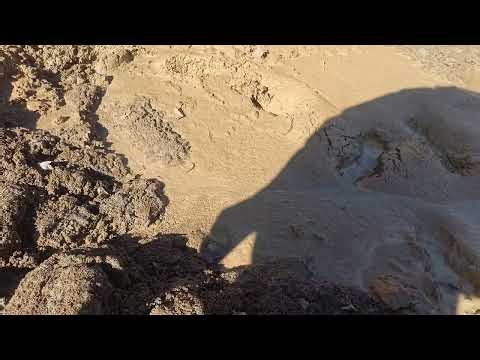Barbour wellies in sticky clay mud at construction site
