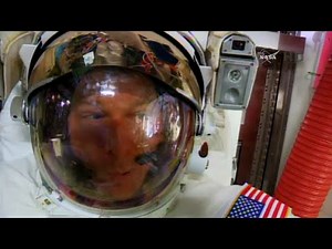 Astronaut's helmet takes on water during spacewalk