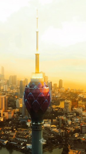 Hirusha C Wilegoda on Instagram: "“Colombo’s skyline crowned by the Lotus Tower, glowing in the golden kiss of sunset.”✨ 🪢LOTUS TOWER - SRI LANKA #ceylonnature #fypシ゚ #ceylonbeauty #visitsrilanka🇱🇰🌏 @djiglobal @cameralk_ @colombolotustower"