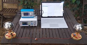 Modulation of scalar waves with a Spooky 2 generator