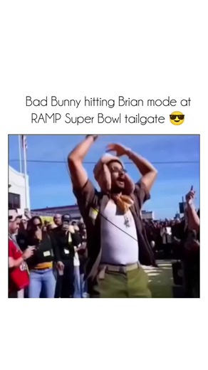 ishow Clips on Instagram: "This post features a wild, chaotic moment from the RAMP Super Bowl Tailgate livestream at Fort Mason Center 😏, Bad Bunny pulls up in full disguise mode—rocking a half-bald Kevin Malone look with the iconic receding hairline wig and *The Office* vibes to blend seamlessly into the Brian Baumgartner bald army swarm, crowd already jumping and hyped to blasting music, no one clocks him at first amid the suits, signs, and Super Bowl pre-game madness... then the reveal hits