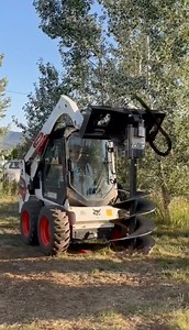 Reach new heights of efficiency with the game-changing Heavy-Duty Auger Attachment by CID. ⭐ 5 stars ⭐ "CID auger and 24” bit is a beast! I bought a Chinese auger and the CID auger probably has 4x the torque at least. The 24” bit is also a must have for any landscape professional. Super solid unit that will be in our tool kit for years to come! Thanks SSS!" - Tony K. Tonygrowsfood #skidsteer #auger #attachment #landscaping #construction #skidsteersolutions | Skid Steer Solutions