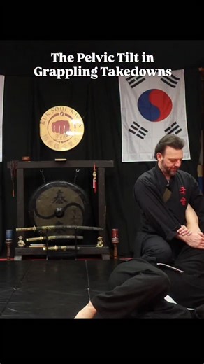 Using one hand on the pelvis to cause a "pelvic tilt" is one of the oldest techniques in grappling. It's actually even seen very often in European fight manuals about "wrestling at the sword." This is the ninth technique in our punch takedown series from Kuk Sool Kwan, one of the earliest kwans of Hapkido. #martialarts #selfdefense #hapkido #mma #jujutsu #kuksoolkwan | Ancient Arts: Kuk Sool Kwan Hapkido