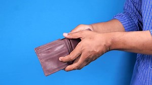 Man hand open an empty wallet with copy space
