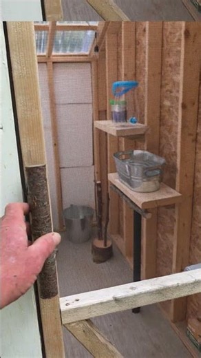 Outdoor off grid gravity fed shower and outhouse