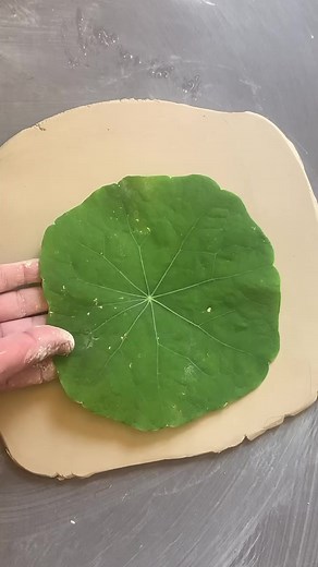 What do you see when you look at a leaf? The cycle of life? Renewal? Nature's fingerprint? Sometimes we don't stop in our busy days to look closely at the gorgeous complexity of a simple leaf (or sometimes flowers take center stage). A leaf is so common in nature yet has a miraculous beauty that is anything but common. That idea is one of the inspirations behind the making of this ceramic leaf dish. Pulling the leaf away from the clay and seeing the intricate impression left in the clay always g