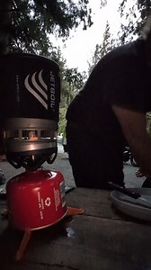 Cooking dinner on the Jetboil while Adam fetched drinks. With a campfire 🔥 ban in effect all our cooking is done with the Jetboil ❤️🖤 | Joyce Dietrich