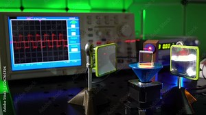 laser in a quantum optics lab. Semiconductor laser on optical table in a quantum physics optics lab.