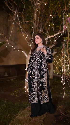 MYNAH on Instagram: "ɴᴇʀɪꜱᴀ ᴠᴇʟᴠᴇᴛ ᴄʜᴏɢᴀ Our stunning client Sijjal Elahi radiates a captivating charm in our top seller Nerisa Velvet Choga. This stunning velvet ensemble features a rich, deep green choga adorned with intricate handwork. The detailed embellishments include a combination of stones, naqshi, dabka, pearls, and sequins, forming exquisite floral patterns that radiate luxury. Its elegant design makes it versatile, allowing it to be paired with a crushed lehenga for a traditional look