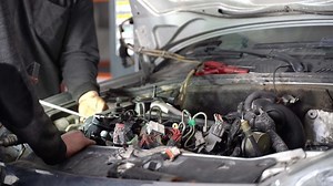 Car Engine Repair Masters.  Masters who examine the engine of the car and disassemble parts.