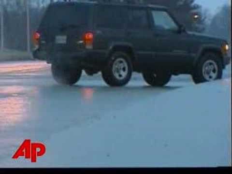 Raw Video: Icy Road Has Drivers Sliding