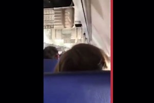 Passenger's Facebook live video as a Southwest Airlines flight a made emergency landing