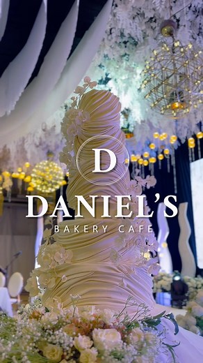 A decade of artistry, countless love stories, one unforgettable cake — yours. Let’s create your sweetest memory yet, get 10% Discount when you book your wedding cake in advance! ✨ | Daniel's Bakery Cafe