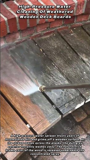 High Pressure Water Cleaning Of Weathered Wooden Deck Boards
