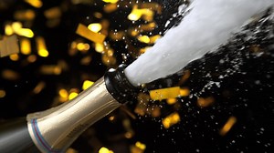 Cork Popping Out Of Champagne Bottle With Golden Confetti In The Background, Slow Motion and Macro | Premium Stock Video Footage