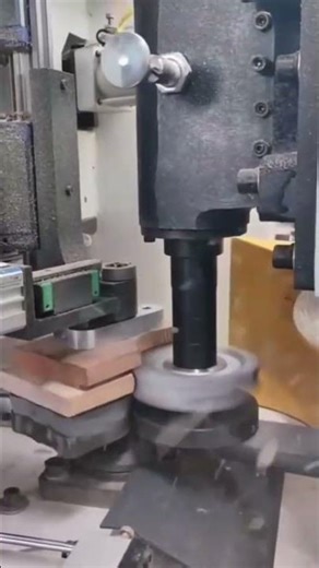 Super Sophisticated Machine automatically sanding small custom wood pieces with high precision