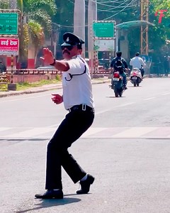 3.2M views · 222K reactions | Dancing officer is a hit with drivers and pedestrians. | Tips & Tricks | Facebook