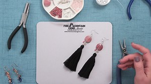 The first project in our wirework series is a gorgeous pair of rhodonite tassel earrings. Go step-by-step with Patti as she teaches you how to create a wire wrapped loop, a bead overwrap, and a simple loop. These are core skills in any wire artist’s repertoire. Find the materials list for this project here: https://bit.ly/39v8FEP | Fire Mountain Gems and Beads