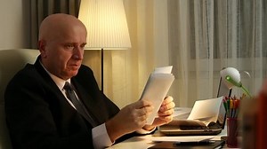 Businessperson Make Accounting Calculations Reading Invoices Payments and Debts (Ultra High Definition, UltraHD, Ultra HD, UHD, 4K, 3840x2160)