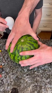 Lightbulb lights from Watermelon. I can't believe this actually worked. did you spot how it works? It is axtually a simple trick bulb, not the watermelon that lights it. It is a remote control with a battery that makes it light, but I put it in a watermelon to make the presentation of this trick more colorful and give it some flare. You can't really light.a bulb with a watermelon. do you like magic tricks like this/ | Adam Trent