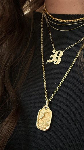 The Spirit Collection just dropped, and it’s one of those collections that feels personal. We took classic shapes you’ll wear forever — round medallions and rectangle pendants — and layered them with symbolism: snakes, hummingbirds, butterflies. Each piece is finished with organic, wavy edges against a satin background, a diamond bale for a touch of strength, and made completely by hand here in our Encinitas studio. Wear it as a reminder, a talisman, or just because it feels like you. . . . . . 