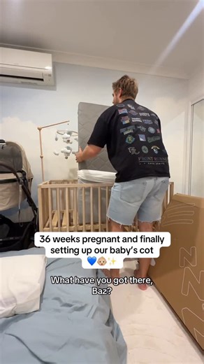 Tarah & Barry 🩵 on Instagram: "Little man’s nursery is finally coming together… these last few weeks are flying by ✨🩵 Ps for anyone wanting to know the details (not spon) 👶🏼 Cot from @sacredbundle Cot mobile from @roomiandme Mattress from @ecosa_sleep Wallpaper from @oliveetoriel #thirdtrimester #nursery #pregnancy"